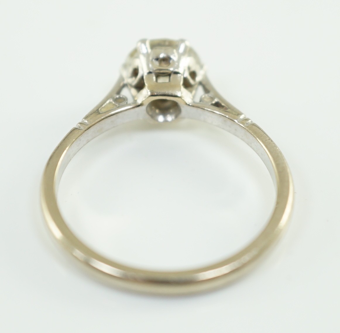 An 18ct white gold, platinum and solitaire diamond set ring